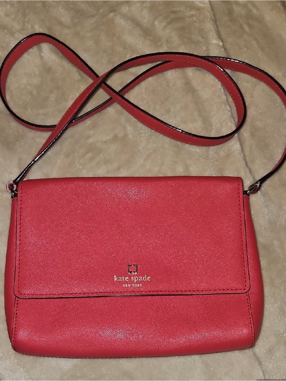kate spade red crossbody with gold logo